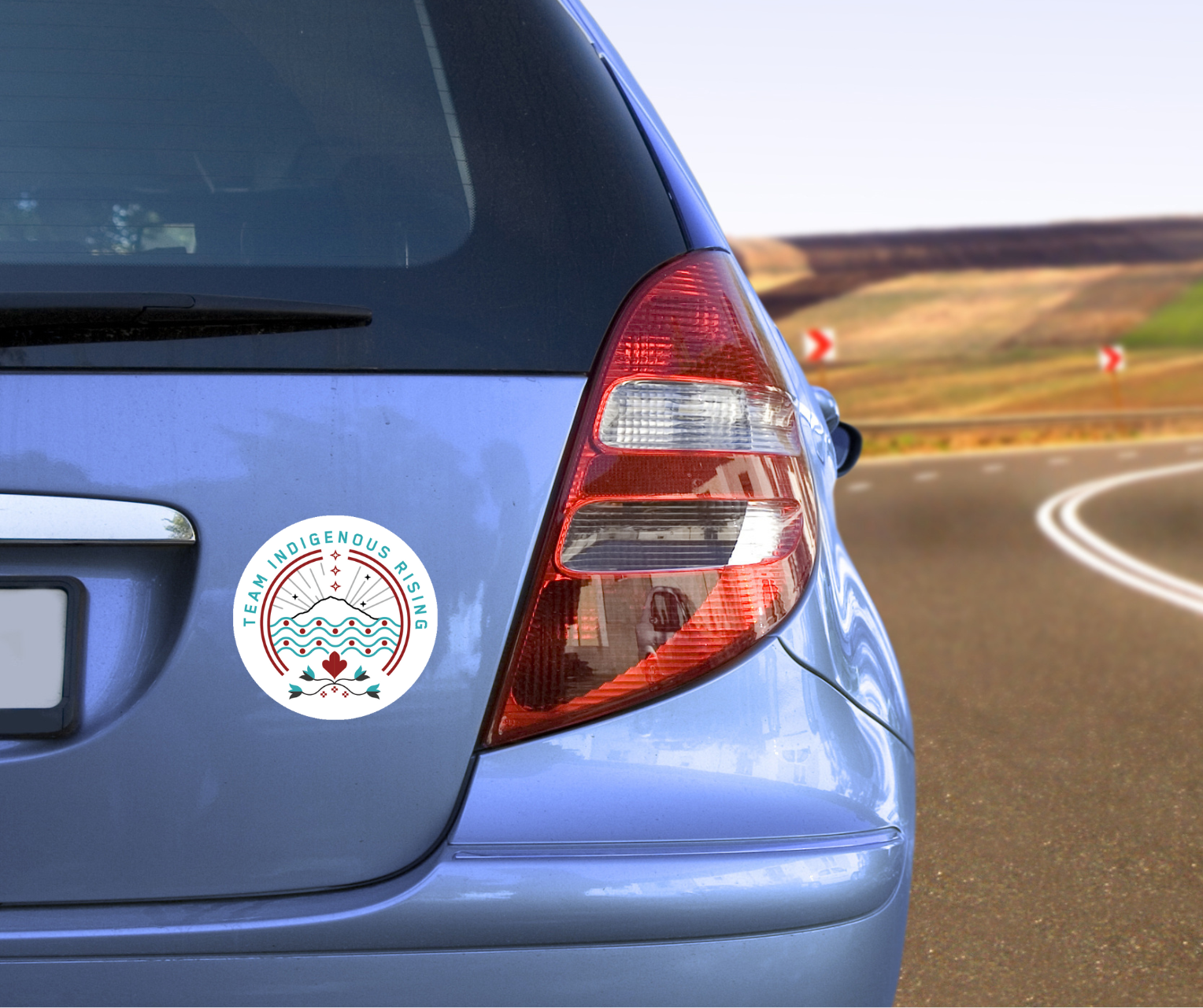 Indigenous Rising Roller Derby 5" car magnet on the back of a car
