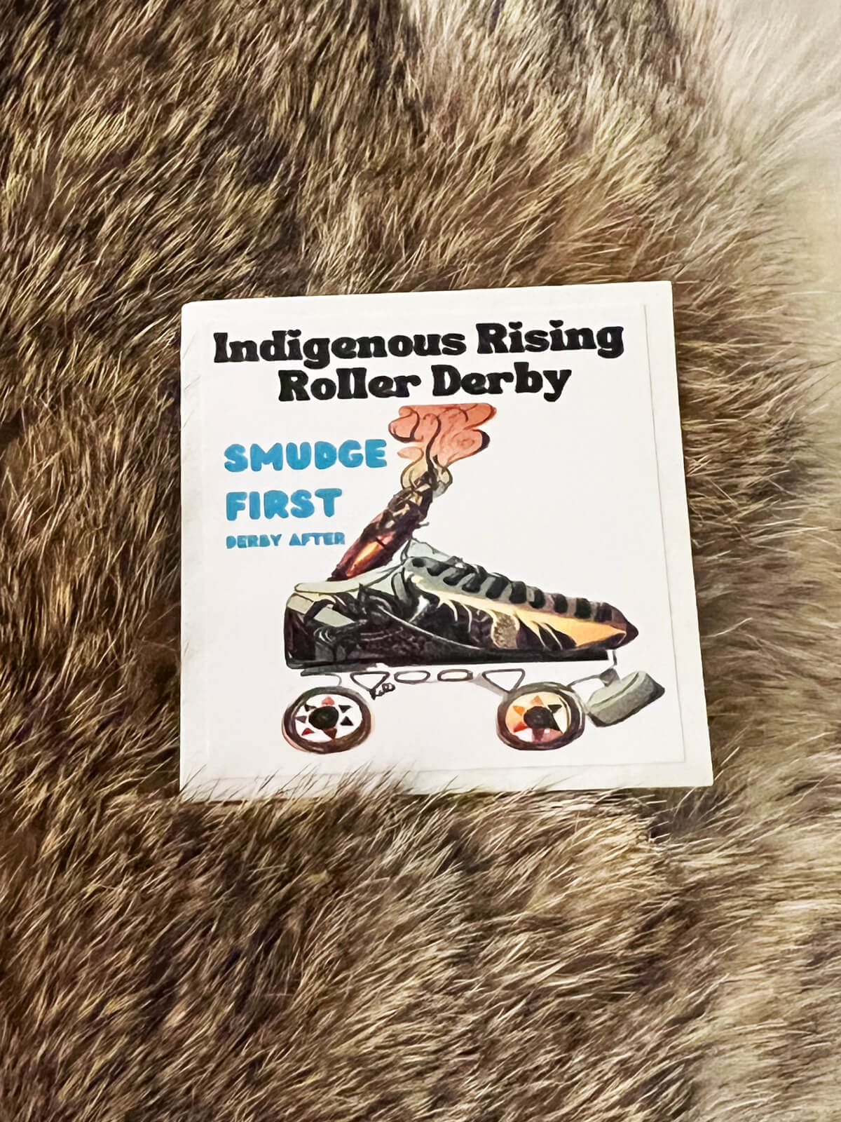 2" Square, white, small Smudge First Derby After Sticker by Indigenous Rising Roller Derby