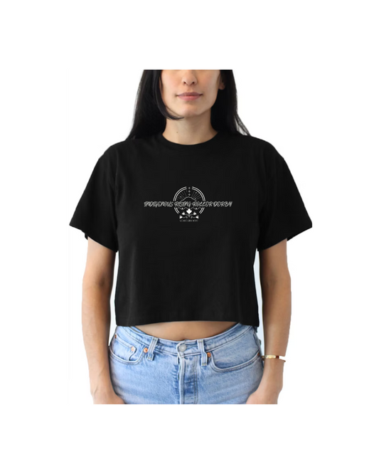 black crop tee with Indigenous Rising Logo with We Are Still Here underneath